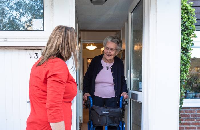 Care companion arriving at a client's home